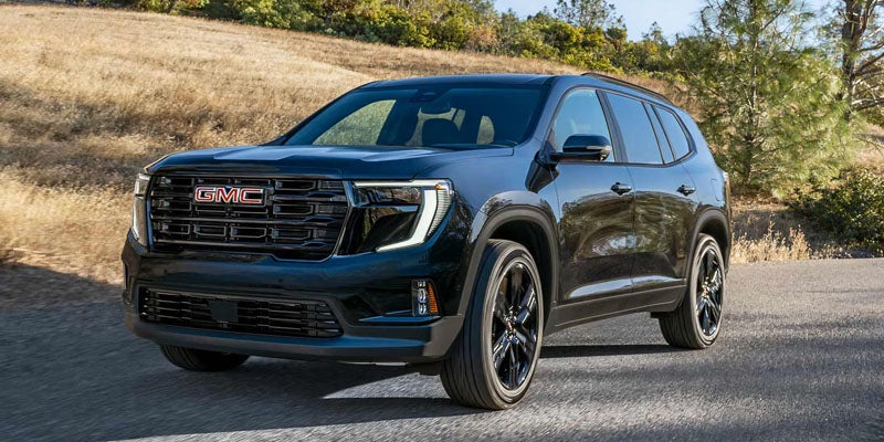 GMC Acadia Blue vehicle off road view